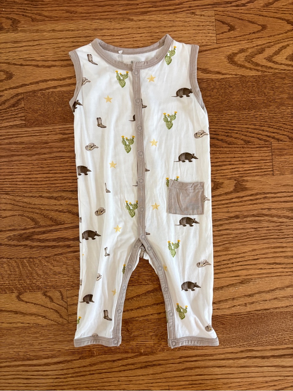Kyte BABY White Sleeveless Romper with Cactus & Armadillo Print